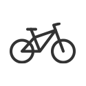 Schlichtes Icon eines Fahrrads in schwarzer Farbe auf weißem, rundem Hintergrund.
